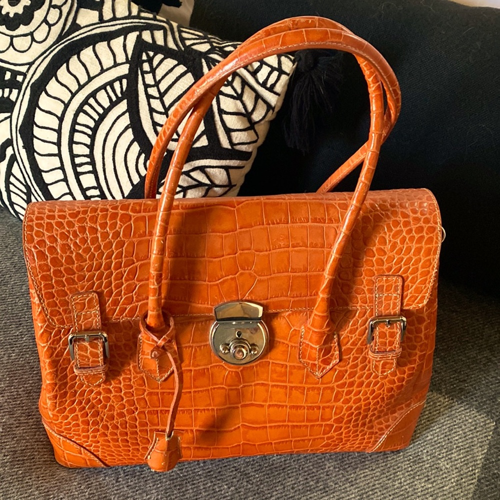 Italian genuine leather embossed in croc pattern handbag with chrome hardware.